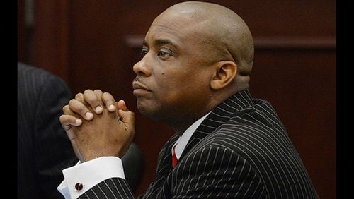Clayton County Sheriff Victor Hill in court during his trial on 27 felony racketeering charges in 2013. JOHNNY CRAWFORD / JCRAWFORD@AJC.COM