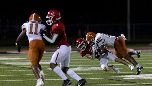 Allatoona’s Camden Phillips (10) is tackled during a GHSA High School Football game between Kell and Allatoona at Allatoona High School in Acworth, GA., on Friday, August 25, 2023. (Photo/Jenn Finch)