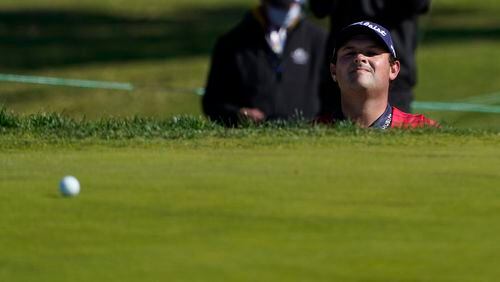 Patrick Reed looks toward his shot on the first green on the South Course during the final round of the Farmers Insurance Open Sunday, Jan. 31, 2021, at Torrey Pines in San Diego. (Gregory Bull/AP)