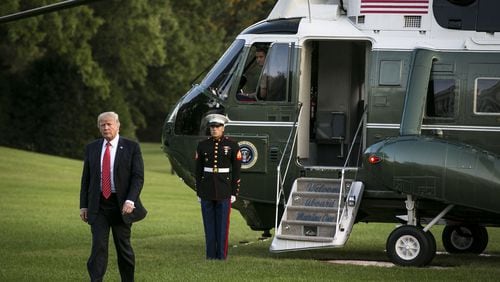 President Donald Trump arrives at the White House on Wednesday after a trip to Reno, Nev., one of many he’s made as president. Calculating the costs to taxpayers of Trump’s travels and protection for his many residences is not simple. (Al Drago/The New York Times)