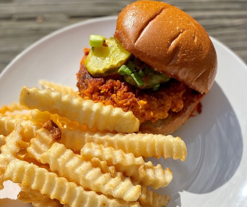 Grass VBQ Joint’s Nashville hot chic’n sandwich is so good you might think it’s real chicken. 
Wendell Brock for The Atlanta Journal-Constitution