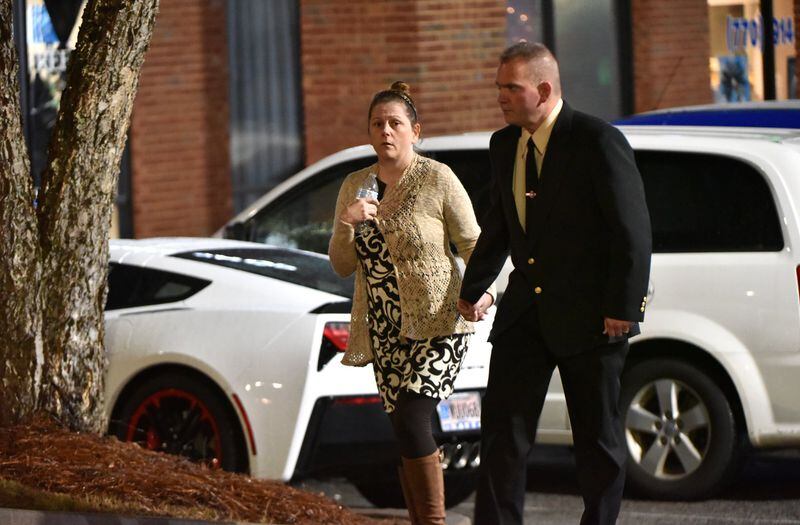 Friends, family, police officers and community members arrive for the visitation for Henry County police Officer Michael Smith at Cannon Cleveland Funeral Directors in McDonough on Wednesday, January 2, 2019. Smith died on December 28, 2018, due to complications from a gunshot wound he suffered on December 6, according to Henry County police. He was 33 years old. 