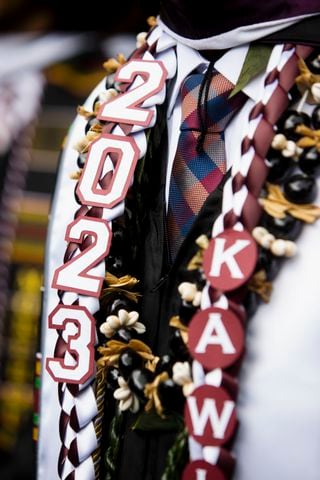 A Morehouse College graduate wears a decorated stoll during the Morehouse College commencement ceremony on Sunday, May 21, 2023, on Century Campus in Atlanta. The graduation marked Morehouse College's 139th commencement program. CHRISTINA MATACOTTA FOR THE ATLANTA JOURNAL-CONSTITUTION