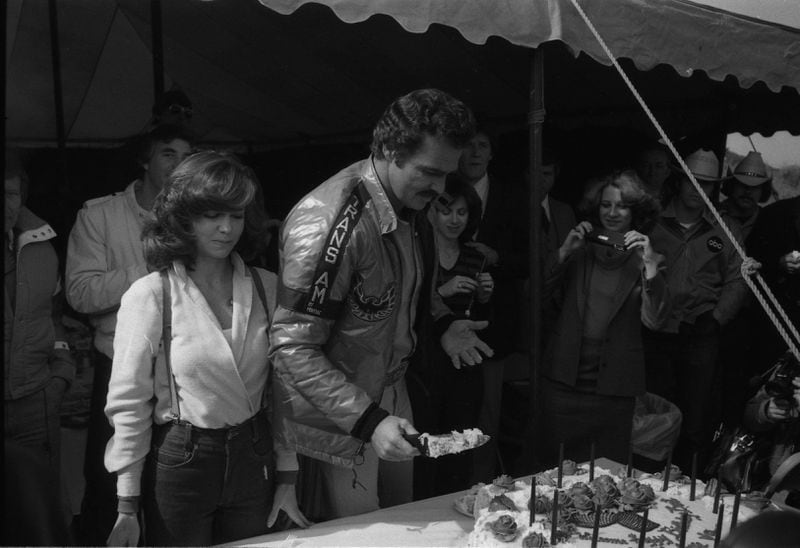 Burt Reynolds' birthday is Feb. 11. On that day in 1980 he was filming "Smokey and the Bandit II" in Atlanta so he and Sally Field and others on the set enjoyed a celebration with birthday cake. Atlanta Journal-Constitution Photographic Archive. Photo: Jerome McClendon