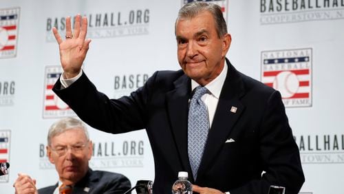 Atlanta Braves president John Schuerholz is acknowledged during a media availability at Major League Baseball's winter meetings, Monday, Dec. 5, 2016 in Oxon Hill, Md.