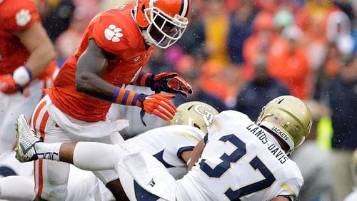 CLEMSON, SC - OCTOBER 10: Jayron Kearse #1 of the Clemson Tigers tackles Mikell Lands-Davis #37 of the Georgia Tech Yellow Jackets during their game at Memorial Stadium on October 10, 2015 in Clemson, South Carolina. (Photo by Tyler Smith/Getty Images)
