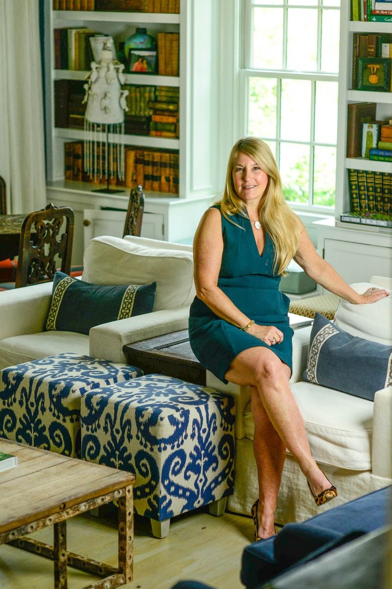 Dina Woodruff, owner of Peridot in Buckhead, purchased her Georgian home in 2011. She has a English cream golden retriever named Madge and a miniature schnauzer named Talley.
