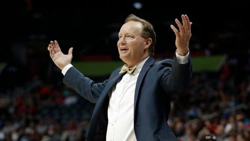 Atlanta Hawks coach Mike Budenholzer reacts after his team was charged with a foul during the second half of an NBA basketball game against the Washington Wizards on Friday, Jan. 27, 2017, in Atlanta. Washington won 112-86. (AP Photo/John Bazemore)