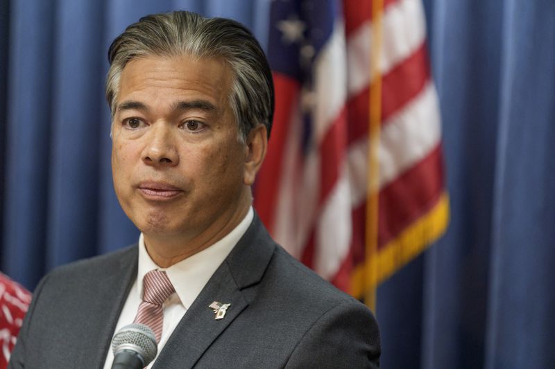 FILE - California Attorney General Rob Bonta announces a lawsuit to protect voter rights at a news conference at the California Department of Justice in Los Angeles Monday, April 15, 2024. A group backing a proposed ballot measure in California that would require school staff to notify parents if their child asks to change gender identification at schools is battling the attorney general in court Friday, arguing he released misleading information about the proposal to the public. (AP Photo/Damian Dovarganes, File)