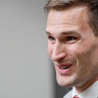Atlanta Falcons quarterback Kirk Cousins smiles as he answers questions during his introductory press conference at the Falcons practice facility in Flowery Branch on Wednesday, March 13, 2024.
Miguel Martinez/miguel.martinezjimenez@ajc.com