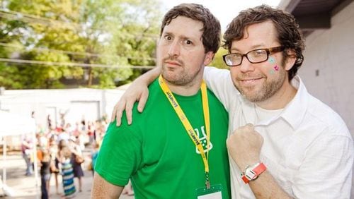 Matt Horgan (left), associate artistic director of Dad’s Garage, with Sean Daniels.
