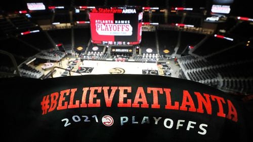Handout shirts #BELIEVEATLANTA cover the seats for fans in State Farm Arena for fourth playoff game between the Hawks and New York Knicks Sunday, May 30, 2021, in Atlanta. (Curtis Compton / Curtis.Compton@ajc.com)