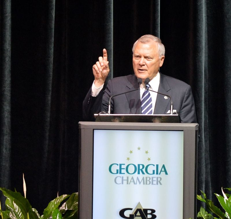 AUGUST 21, 2014 MACON Governor Nathan Deal gives opening remarks at the forum. U.S. Senate candidates Michelle Nunn and David Perdue participate in a forum sponsored by the Georgia Chamber at the Marriott City Center in Macon, Thursday, August 21, 2014. Over 1100 people came out to hear what they would do for Georgians if elected to the U.S. Senate in the November election. KENT D. JOHNSON / KDJOHNSON@AJC.COM Gov. Nathan Deal