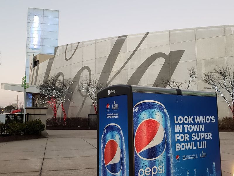 With the Super Bowl headed for Atlanta, some of Georgia’s big companies face their biggest rivals having a marketing advantage as official sponsors of the game, allowed to use the Super Bowl and NFL trademarks. Outside the World of Coke in downtown Atlanta, Coca-Cola Co. (not an official Super Bowl sponsor) is already getting ribbed by PepsiCo, an official sponsor. MATT KEMPNER / AJC