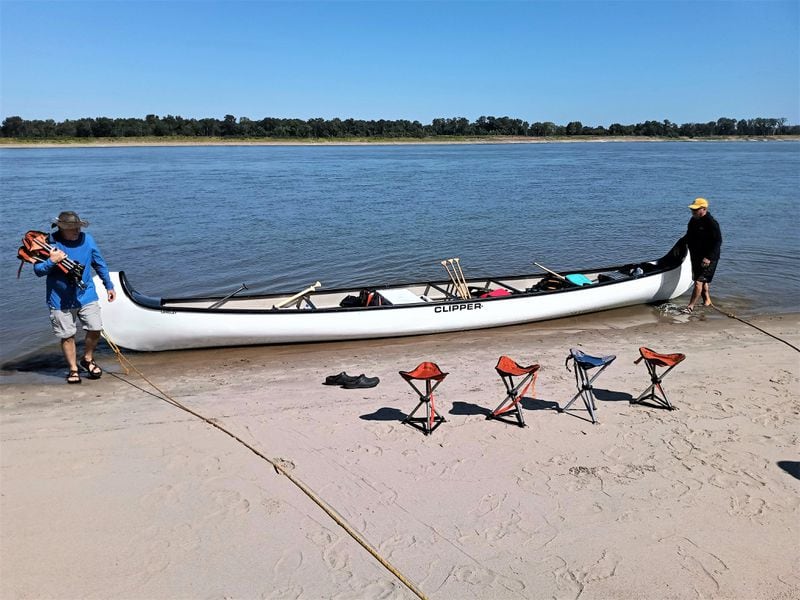 River guide Layne Logue, left, helps beach a canoe on an exposed sandbar in the Mississippi River during a daytime excursion with the Quapaw Canoe Company's Vicksburg outpost.
(Courtesy of Blake Guthrie)