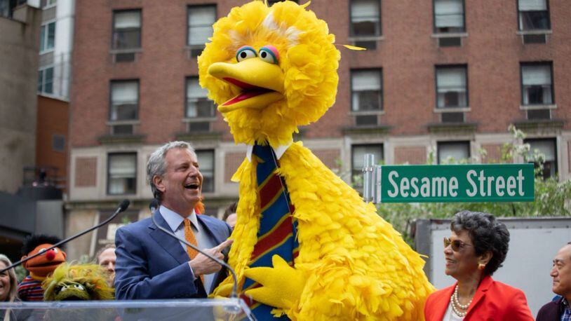 The city renamed the intersection of 63rd Street and Broadway Avenue Wednesday for “Sesame Street” in honor of the long-running children’s television show’s 50th anniversary. (Photo: Mayor Bill de Blasio)