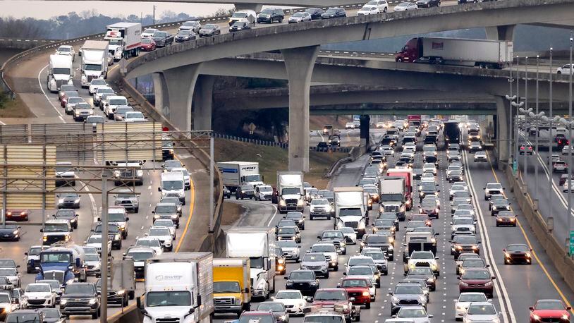 Traffic travels northbound on I-85 just past the I-285 overpass, also known as Spaghetti Junction, earlier this year. (File photo by Jason Getz / Jason.Getz@ajc.com)