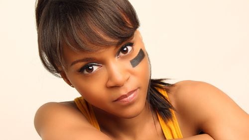 Kerisse Hutchinson wrote and performs in a one-woman play about Lisa “Left Eye” Lopes. CONTRIBUTED BY LOUIS CUTHBERT