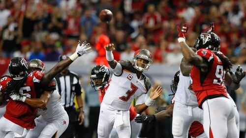Buccaneers quarterback Jameis Winston passes against the Falcons at the Georgia Dome on September 11, 2016 in Atlanta.