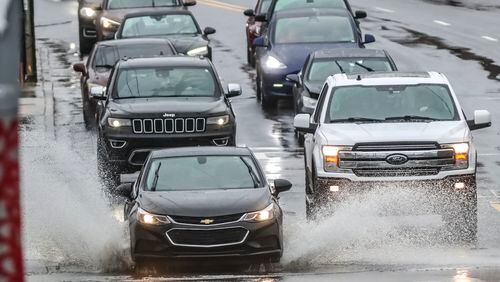 Severe weather, including waves of storms and possible flooding, are expected to roll into North Georgia Sunday night and continue through the day on Monday.  (John Spink / John.Spink@ajc.com)