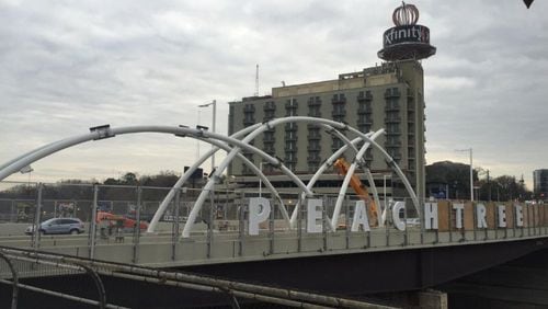 The north Peachtree Street bridge, as shown in this March 20 photo, is getting an installation that consists of 20 minor arches and two major ones.