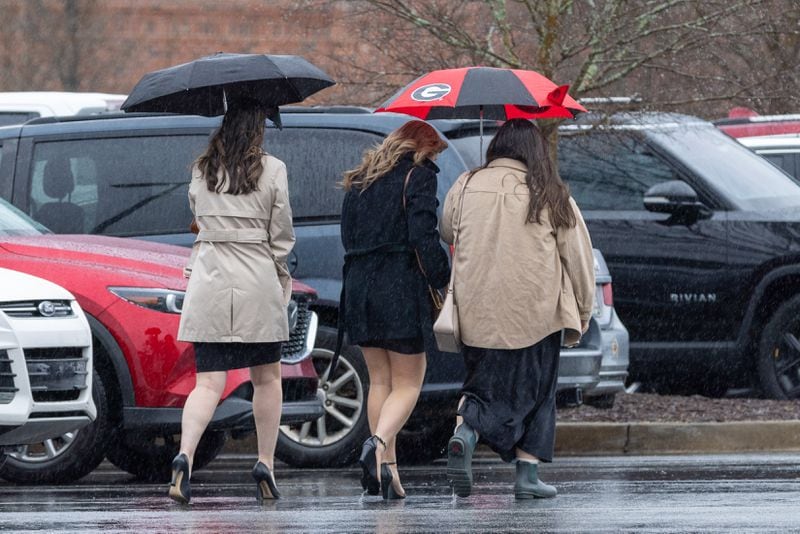 Mourners enter the funeral for Laken Riley, the 22-year-old nursing student who was killed last week on UGA’s campus, at Woodstock City Church in Woodstock on Friday, March 1, 2024. (Arvin Temkar / arvin.temkar@ajc.com)