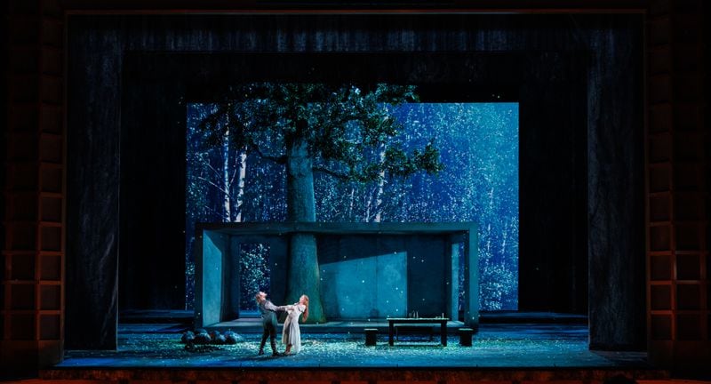 Erhard Rom’s sets are big but minimalist: a concrete rectangular home for Act I serves as a setting for Viktor Antipenko as Siegmund and Laura Wilde as Sieglinde.