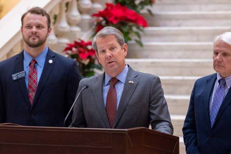 Gov. Brian Kemp speaks at a new conference at the Capitol in Atlanta on Monday, December 18, 2023. He announced that he’ll provide a $1,000 retention bonus to state employees, teachers and school support staff this holiday season. (Arvin Temkar/arvin.temkar@ajc.com)