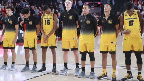 The Kennesaw State basketball team stands for the National Anthem to start the game against Georgia during the first half in their NCAA college basketball game on Tuesday, Nov. 27, 2018, in Athens.