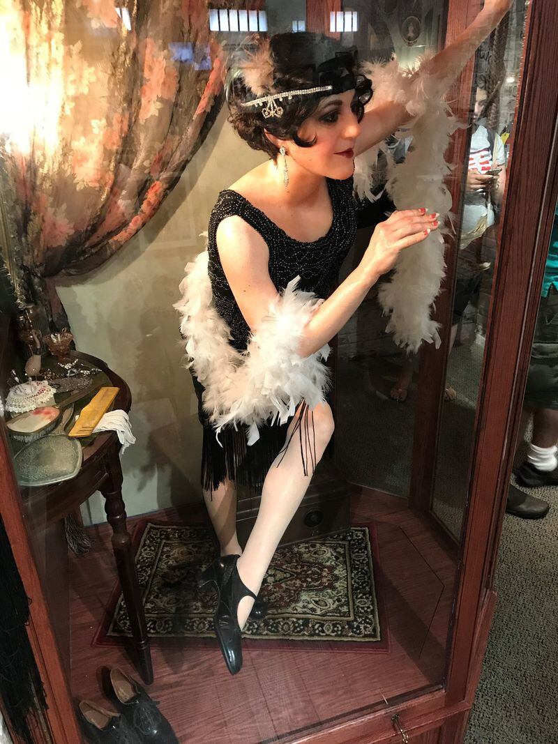 Exhibits at the American Prohibition Museum bring attention to speakeasies, and how tightly woven they were to the rise of jazz and flapper fashionistas. Photo by Ligaya Figueras.