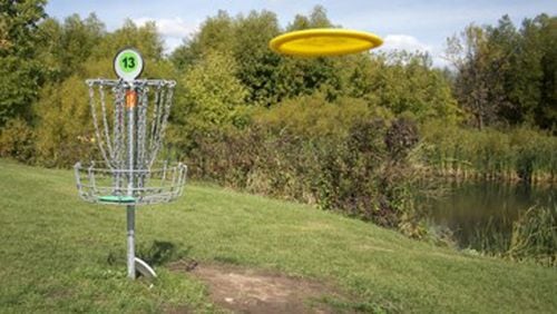 A new 18-hole disc golf course will open at 10 a.m. Nov. 12 at DeKalb Memorial Park, 381 Wilkerson Drive. AJC file photo
