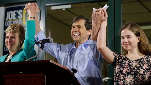 In this April 26, 2016, file photo, former Congressman Joe Sestak, center, his wife Susan Sestak, left, and daughter Alex Sestak react after speaking to supporters gathered outside his campaign headquarters in Media, Pa. Sestak has become the latest Democrat to enter the presidential race.