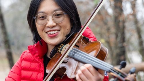 Jean Yu plays at Jones Bridge Park in Peachtree Corners. She created an organization called "Mindful Companions," that provides mindful moments and holiday concerts for seniors living communities. PHIL SKINNER FOR THE ATLANTA JOURNAL-CONSTITUTION