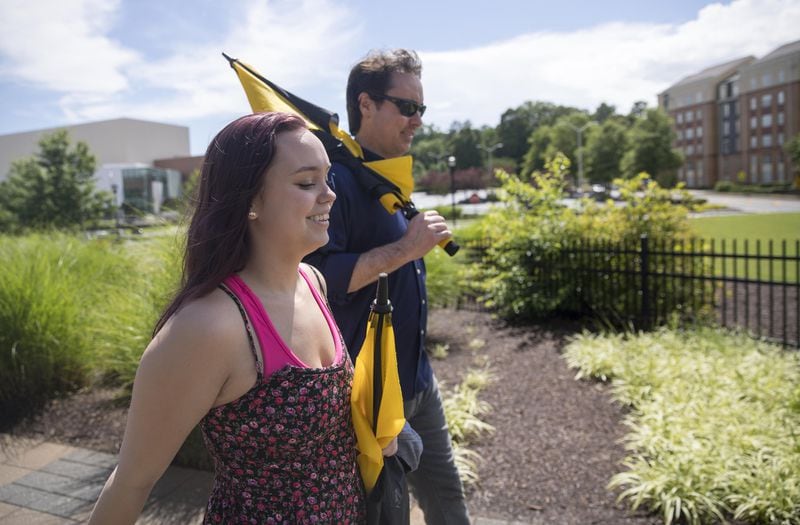 Johnny and Grace, a rising senior at Riverwood International Charter High School, tour the campus of Kennesaw State University. PHOTOS BY ALYSSA POINTER/ATLANTA JOURNAL-CONSTITUTION