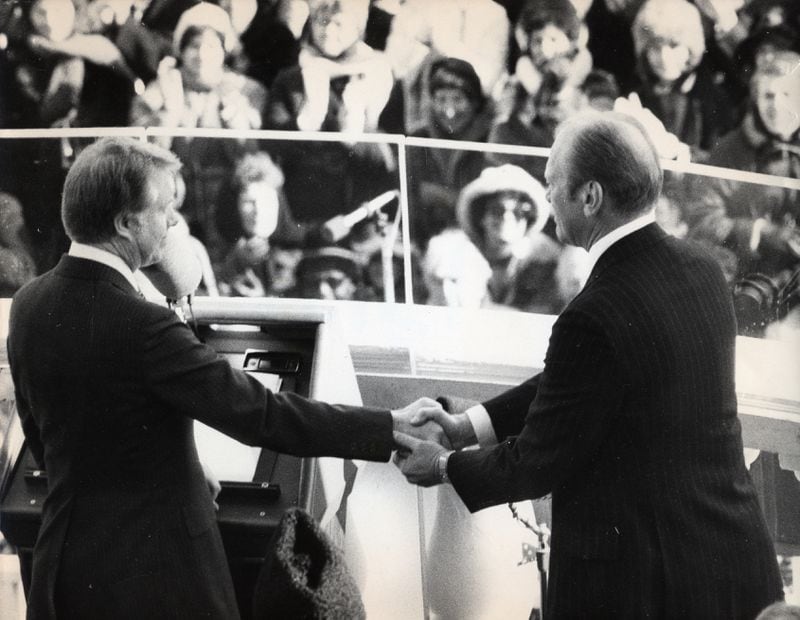 Jimmy Carter and Gerald Ford at the January 20, 1977 Presidential Inauguration. Ford had unexpectedly inherited the Oval Office when President Richard Nixon resigned in August 1974, and Carter in his inaugural address thanked Ford “for all he did to heal our land.” He repeated that sentiment more than three decades later when he spoke at his friend Ford’s funeral. Photo Credit:  Bill Mahan