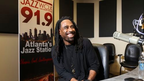 WCLK entertainment host and marketing director Ray Cornelius Cobb at their station on the lower level of the Woodruff Library on Clark Atlanta’s campus, Thursday, January 25, 2024, in Atlanta. WCLK will celebrate its 50th birthday in April. (Jason Getz / jason.getz@ajc.com)