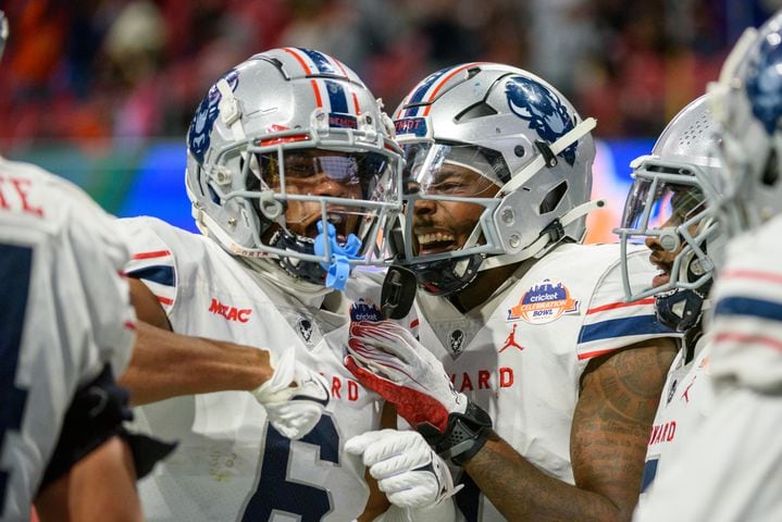 Carson Hinton, defensive back for Howard University, celebrates an interception and touchdown against Florida A&M in the Celebration Bowl at Mercedes Benz Stadium in Atlanta, Georgia on Dec. 16, 2023. (Jamie Spaar for the Atlanta Journal Constitution)