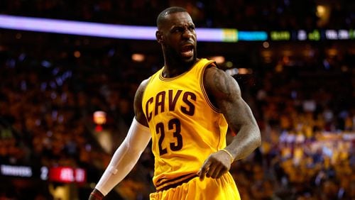 LeBron James #23 of the Cleveland Cavaliers reacts after a play in the first quarter against the Atlanta Hawks during Game Four of the Eastern Conference Finals of the 2015 NBA Playoffs at Quicken Loans Arena on May 26, 2015 in Cleveland, Ohio.