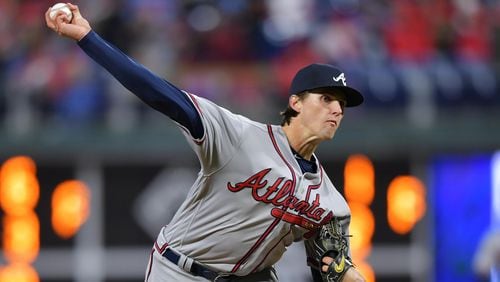 Braves starting pitcher Kyle Wright delivers a pitch in the second inning against the Philadelphia Phillies Sunday, March 31, 2019, at Citizens Bank Park in Philadelphia.