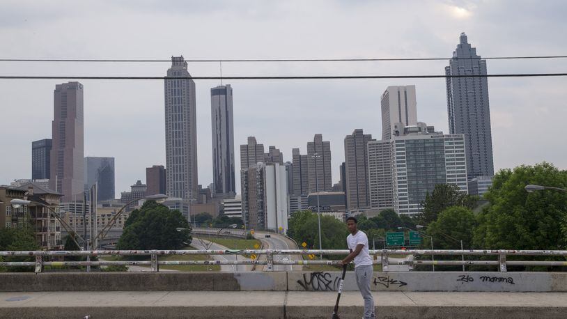 After a summer packed with residents’ cries for safer streets, Atlanta has accepted a $10,000 grant to improve the Jackson Street Bridge to make it safer for bicyclists, pedestrians, and electric scooter riders. ALYSSA POINTER/ATLANTA JOURNAL-CONSTITUTION