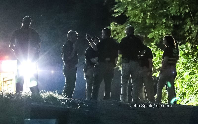 The shooting resulted from a SWAT standoff at a home in the 10 block of Grand Prix Street near Cumming, Forsyth County authorities said. JOHN SPINK / JSPINK@AJC.COM