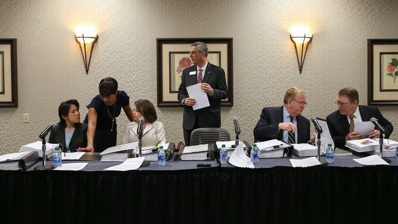 State Election Board members prepare for an emergency hearing in March at the Georgia Center for Continuing Education in Athens. (Photo/Austin Steele for The Atlanta Journal Constitution)
