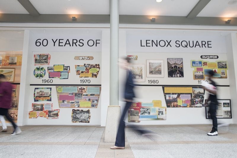 A visual timeline of the history of Lenox Square is displayed at the mall in Atlanta, to celebrate its 60 year anniversary. (Alyssa Pointer/alyssa.pointer@ajc.com)