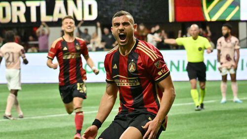 Atlanta United's Giorgos Giakoumakis celebrates after scoring during the second half against Portland on Saturday night at Mercedes-Benz Stadium. Atlanta United won 5-1. (Hyosub Shin / Hyosub.Shin@ajc.com)