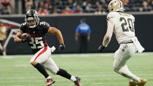 Avery Williams (35) of the Falcons carries the ball during the second quarter against the New Orleans Saints at Mercedes-Benz Stadium on Sunday, September 11, 2022. Miguel Martinez / miguel.martinezjimenez@ajc.com