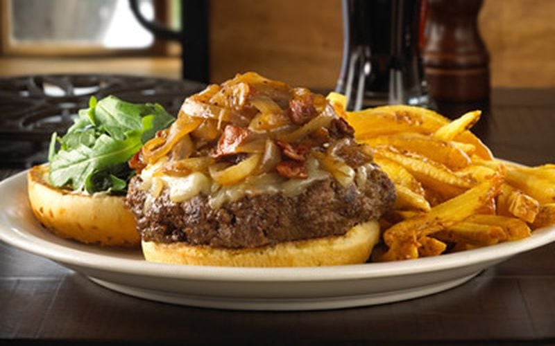 The Avalon Burger at Ted's Montana Grill is served with gruyere, blue cheese, bacon caramalized onions, roasted garlic aioli and baby arugala.