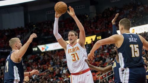 Atlanta Hawks forward Mike Muscala (31) passes during an NBA game against the Denver Nuggets at Philips Arena, Friday, Oct. 27, 2017, in Atlanta.  BRANDEN CAMP/SPECIAL