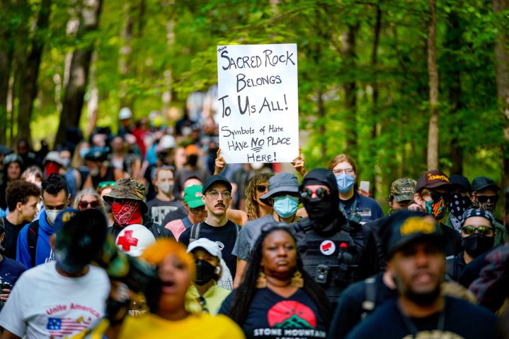Counterprotesters march toward Stone Mountain Park. The park attractions were shut down Saturday, April 30, 2022, due to the Sons of Confederate Veterans event. (Photo: Ben Hendren for the Atlanta Journal Constitution)