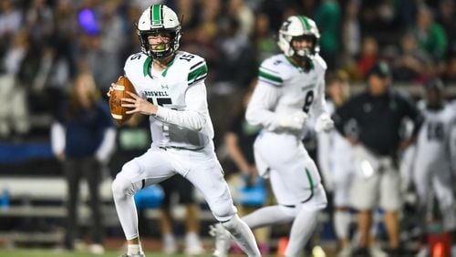 Roswell's Ethan Roberts drops back to pass during Friday's game against Walton. (AJ Reynolds/Special)