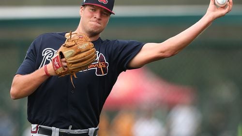 Braves 6-foot-9 reliever Adam McCreery has made big progress in two years in the organization and was added to the 40-man roster in November.  (Curtis Compton/ccompton@ajc.com)
